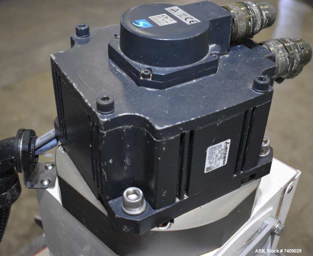 Used Leepack Servo Drive Powder Auger Feeder, Model AW-590IV. Mitsubishi model MR-JZS-200A servo drive. Foot pedal switch. Level sensor. Mounted on stainless steel frame with casters. 3/60/480 Volt.